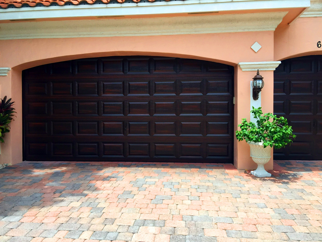 Faux mahogany finish on arched garage door