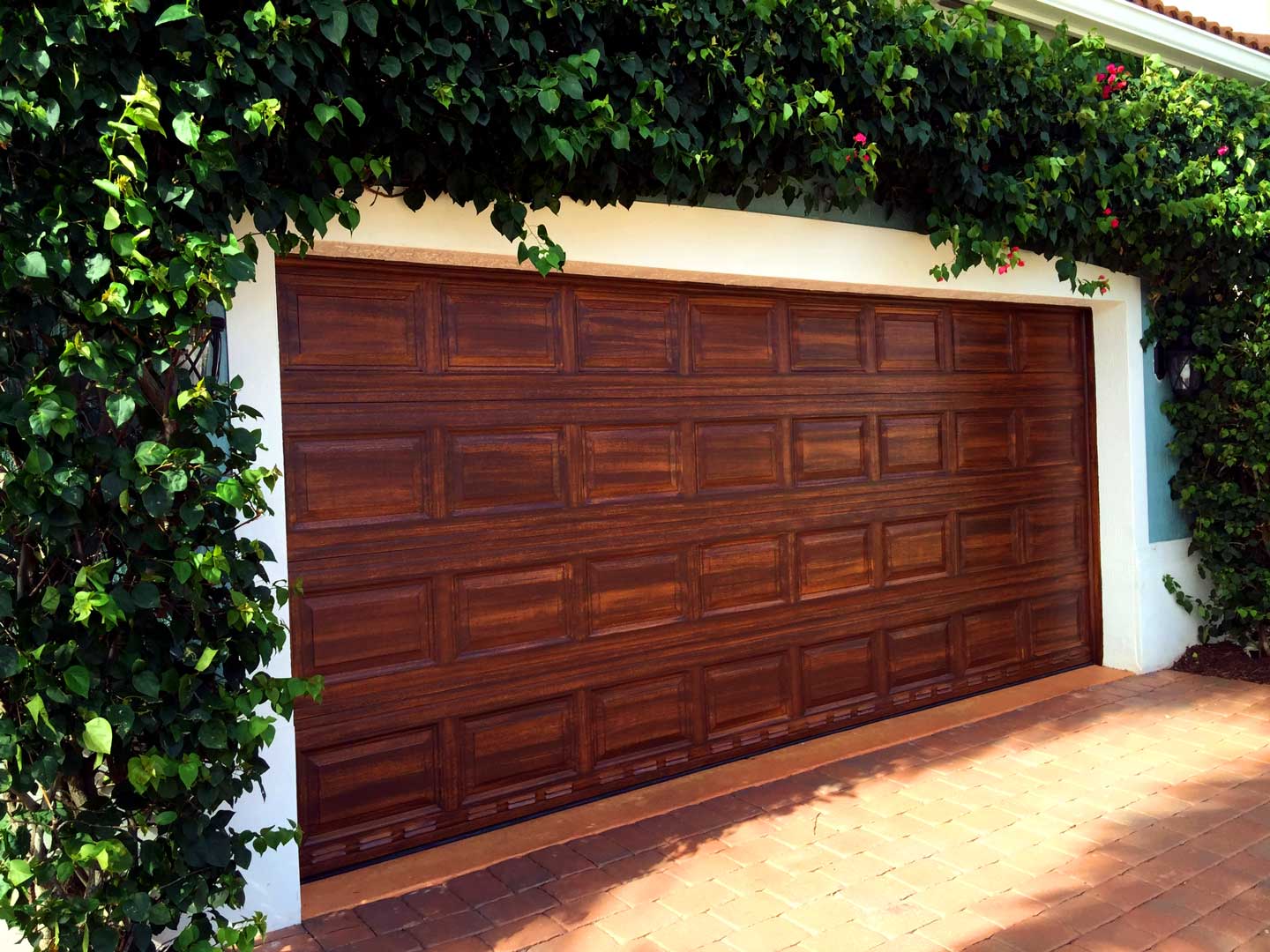 Faux walnut finish on double-wide garage door